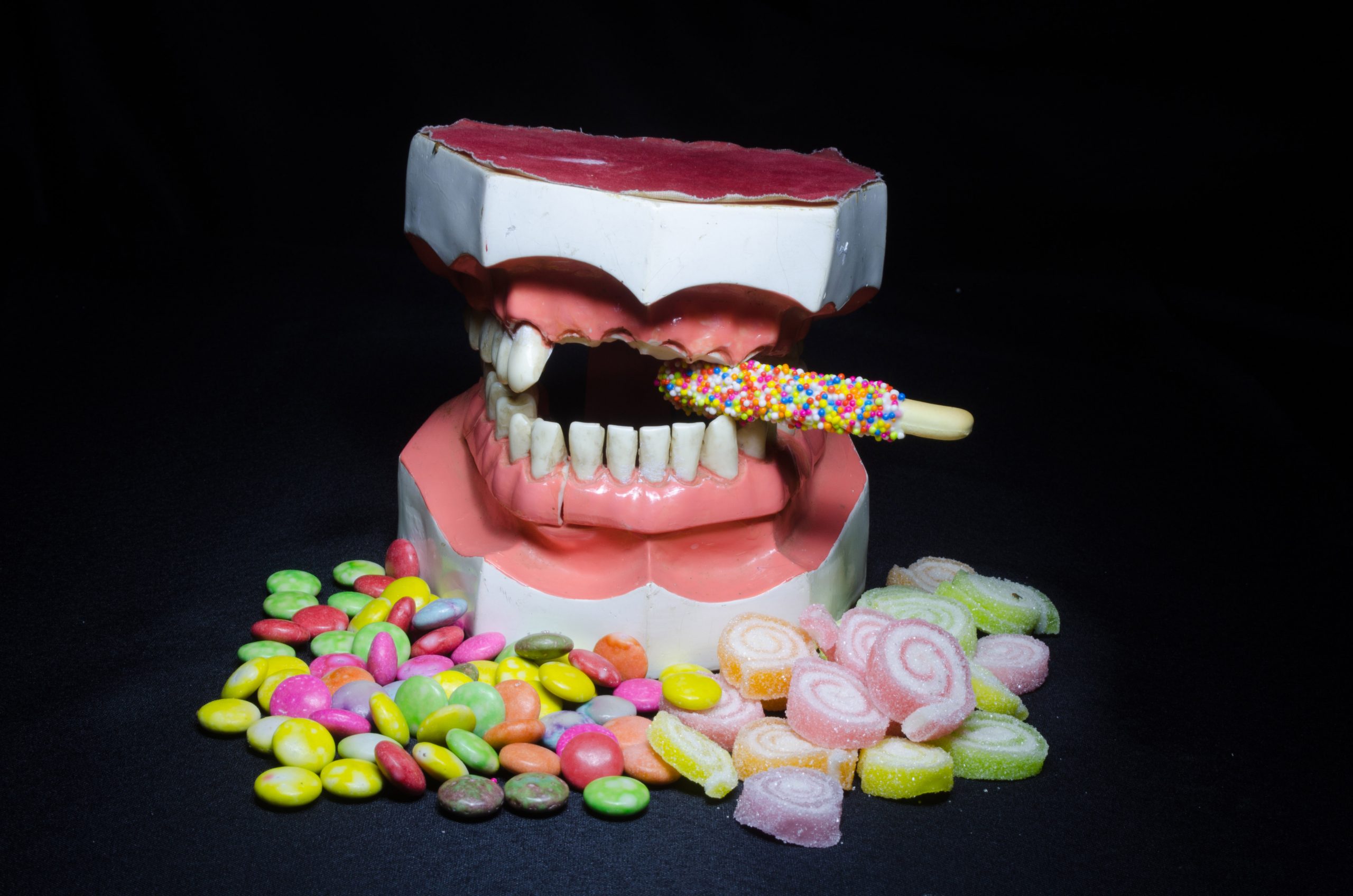 pile of candy with broken teeth