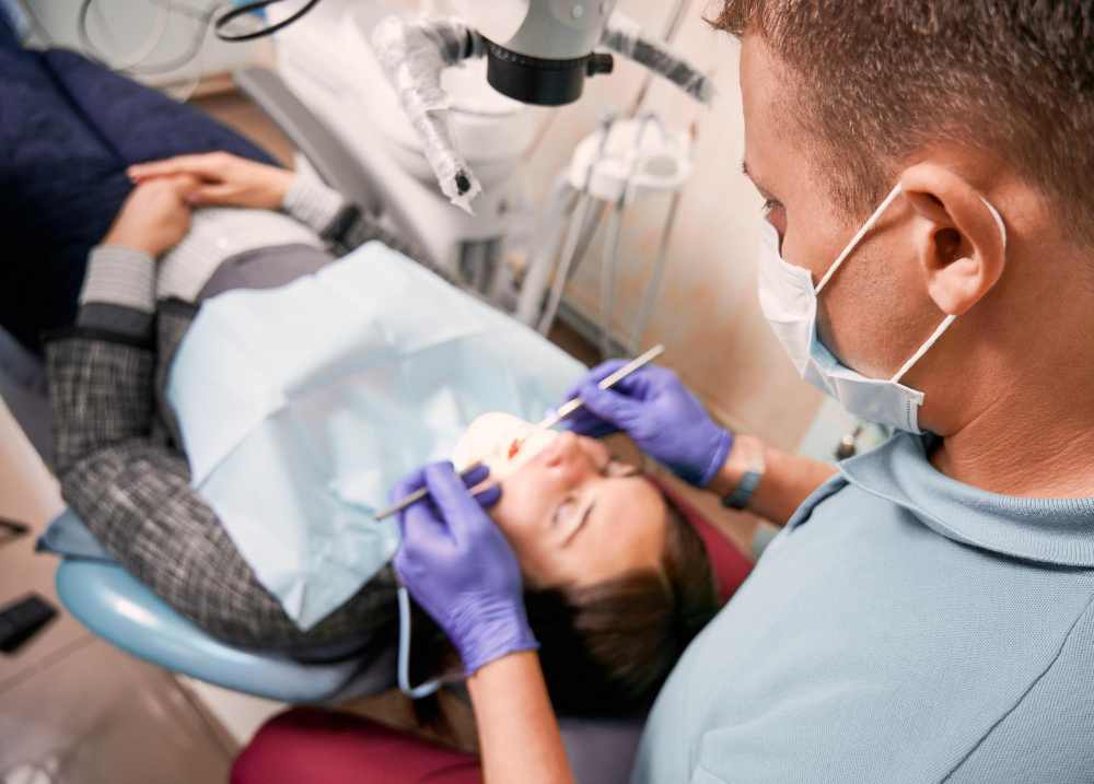 woman getting examined at the dentist on south shore boucherville